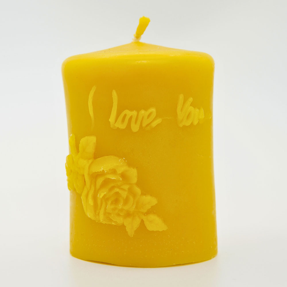 Hand-poured I Love You beeswax candle by Buzzy Honey Bee, Nottingham