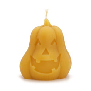Jack-o-lantern pumpkin candle in golden yellow beeswax
