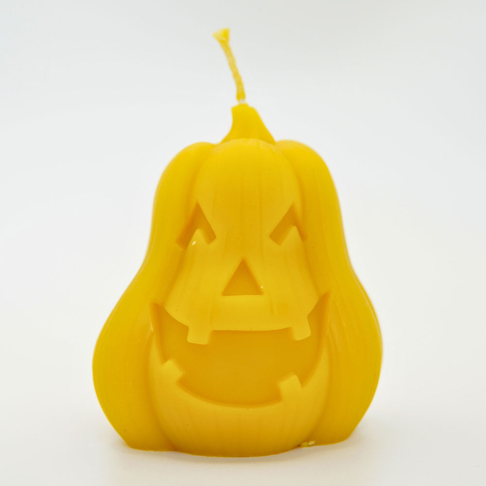 Handmade pumpkin beeswax candle by Buzzy Honey Bee, Nottingham