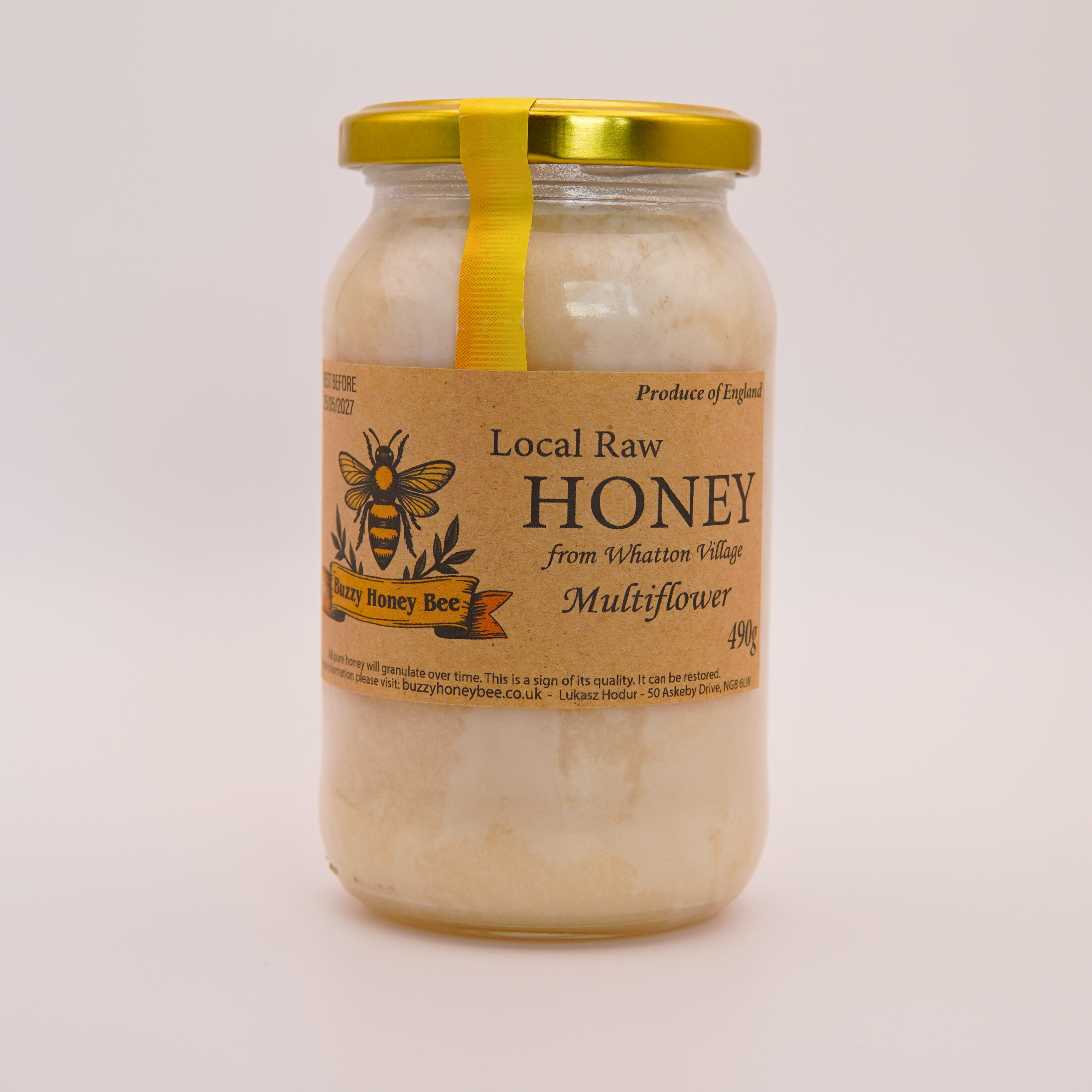 Jar of local raw set honey by Buzzy Honey Bee, harvested in Whatton Village