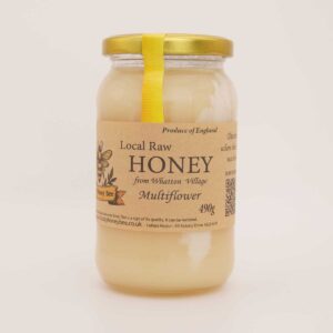 Raw multiflower set honey from Whatton Village in a 490g glass jar with gold lid and kraft label