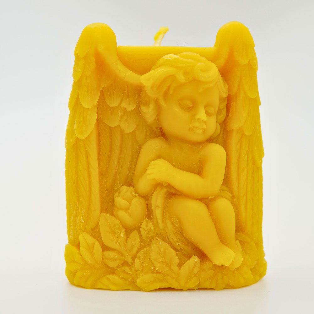 Hand-poured sleeping angel beeswax candle by Buzzy Honey Bee, Nottingham