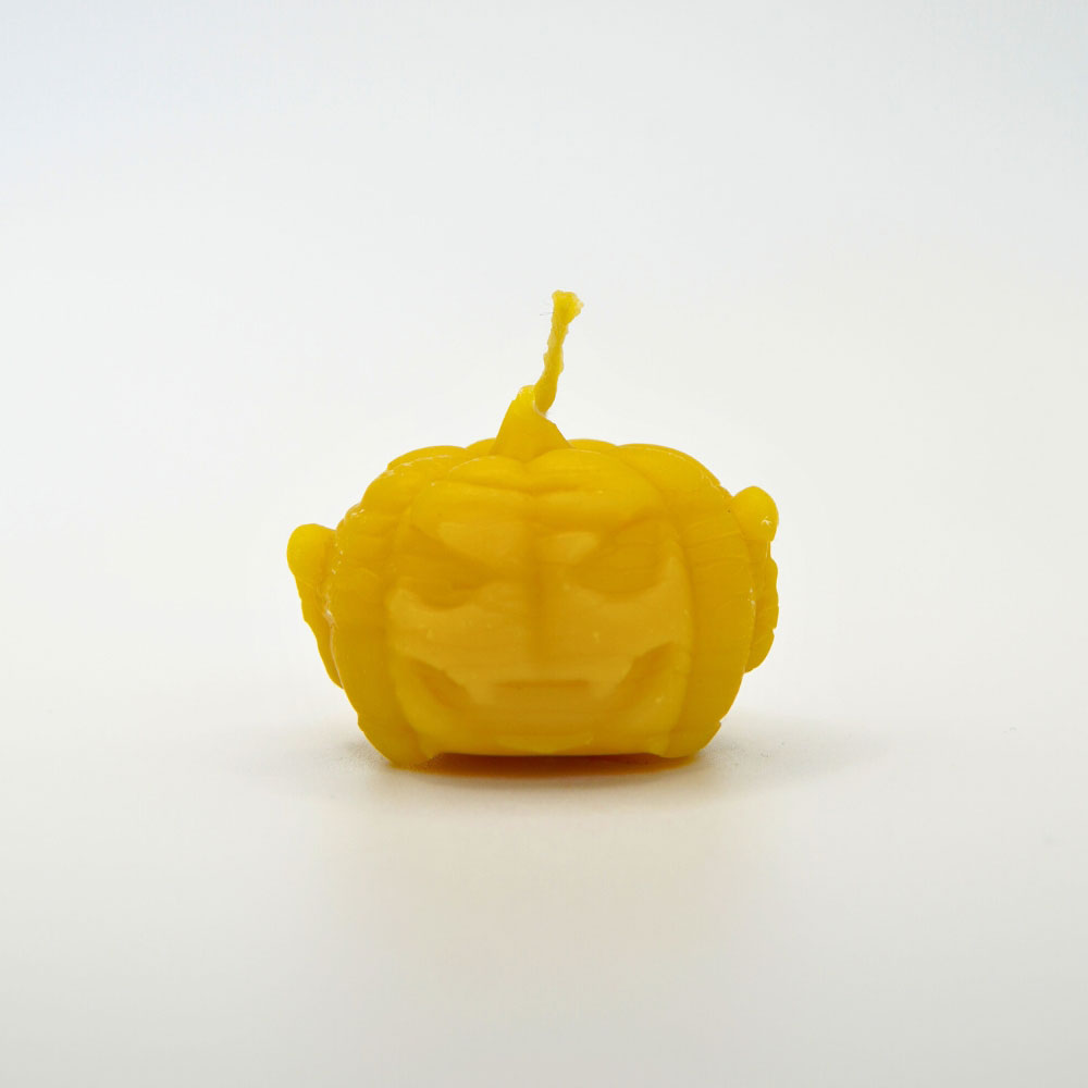 Hand-poured small pumpkin beeswax candle by Buzzy Honey Bee, Nottingham