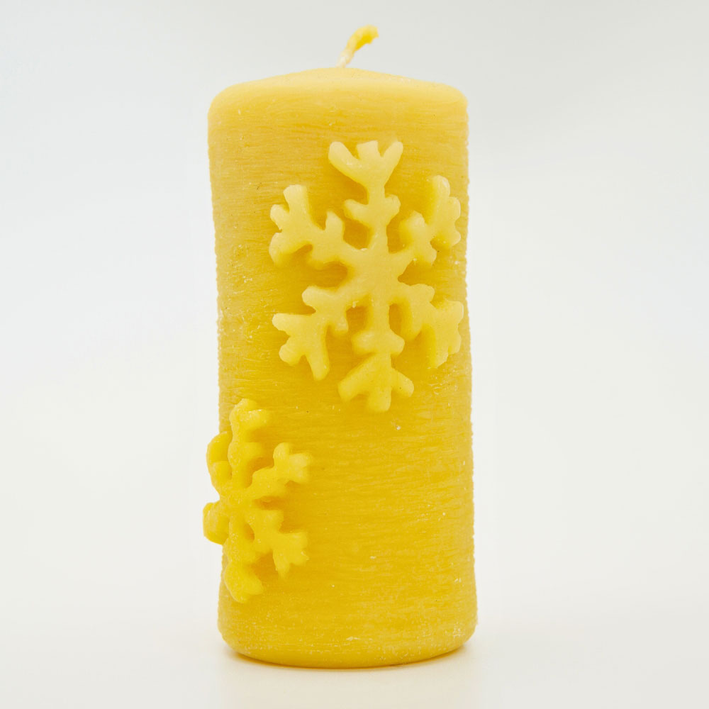 Hand-poured snowflake beeswax candle by Buzzy Honey Bee, Nottingham