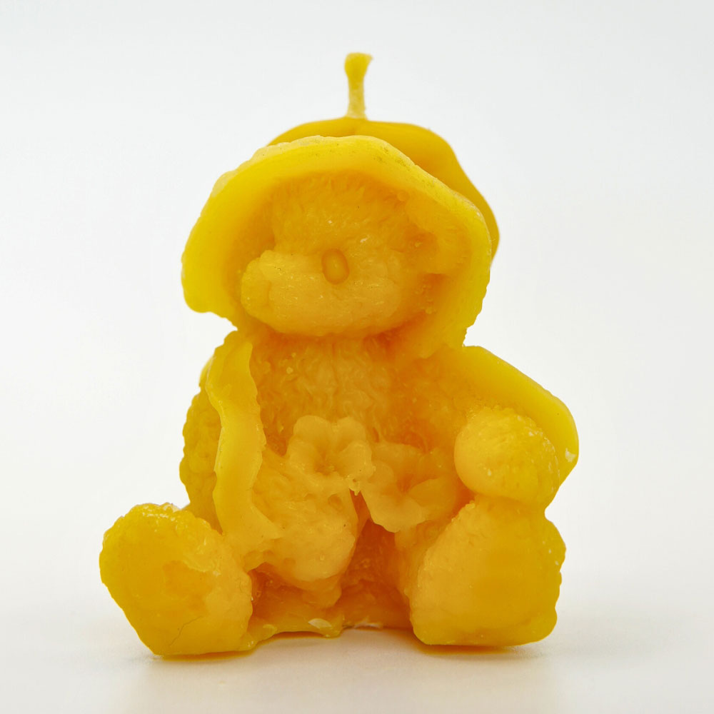 Hand-poured teddy bear with hat beeswax candle by Buzzy Honey Bee, Nottingham