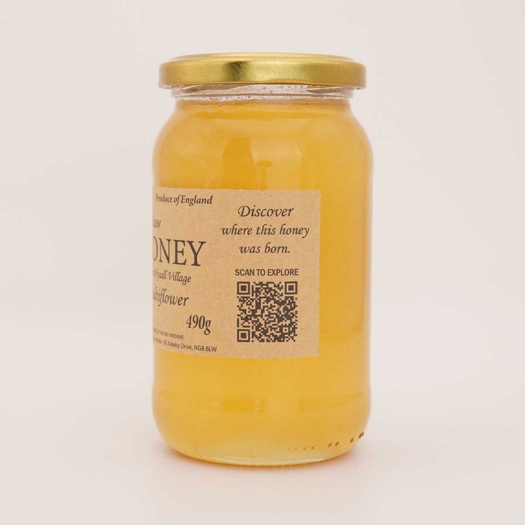 Traceable local raw honey jar with QR code on the label